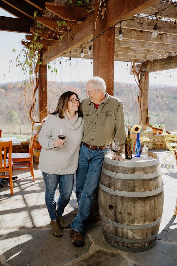 Eric and DeAnne Seifarth, owners of Crane Creek Vineyards, take a moment to enjoy the fruits of their labors. 
(Courtesy of Crane Creek Vineyards.)