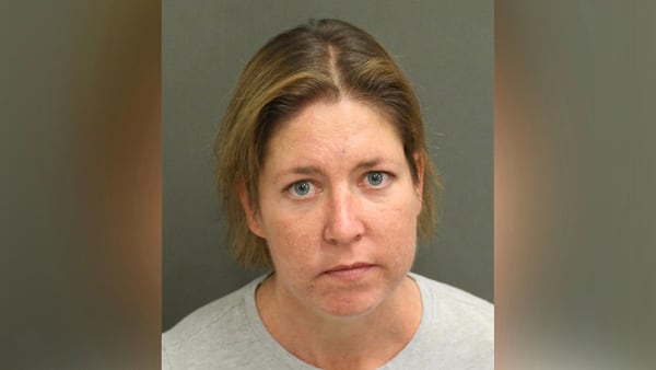 Sarah Boone, 42, is charged with second-degree murder after her boyfriend Jorge Torres Jr., 42, was found dead zipped up inside a suitcase, according to reports. Police later searched Boone's cellphone and found video of Torres trying to free himself and calling for help.