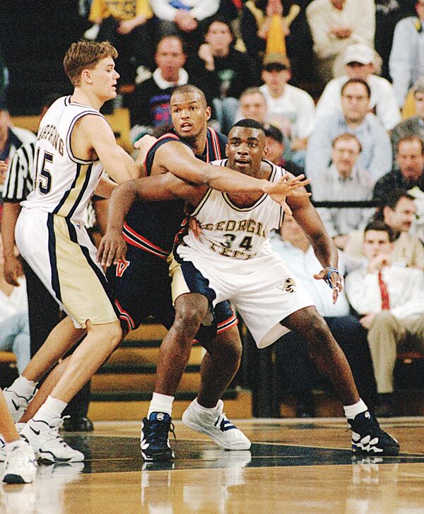 950222 Ga Tech vs Virginia 25 Norman Nolan of Virginia tries to prevent 34 James Forrest from recieving a pass as Matt Harpring tries to help Forrest