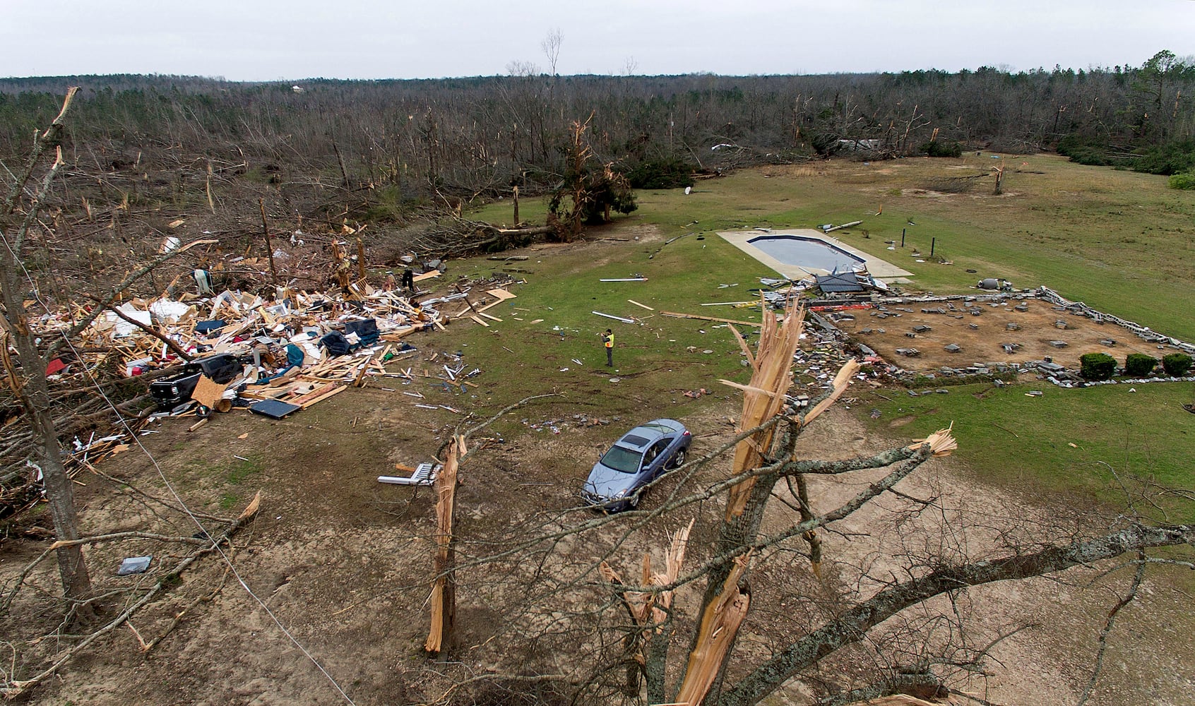 Photos: Tornadoes leave path of death, destruction in parts of Southeast