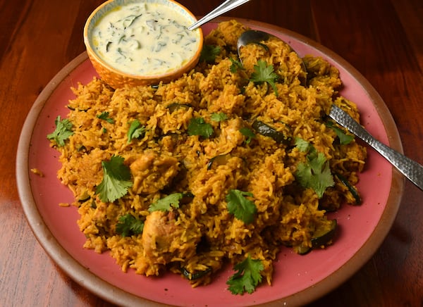 Sahar Siddiqi's Chicken Tahiri with Cucumber Curry Leaf Raita. (CHRIS HUNT FOR THE ATLANTA JOURNAL-CONSTITUTION)