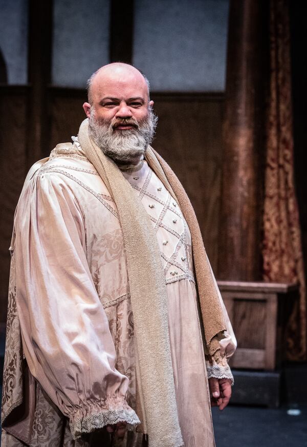 Sir John Falstaff (Vinnie Mascola) scoffs at the repeated humiliations he endures.