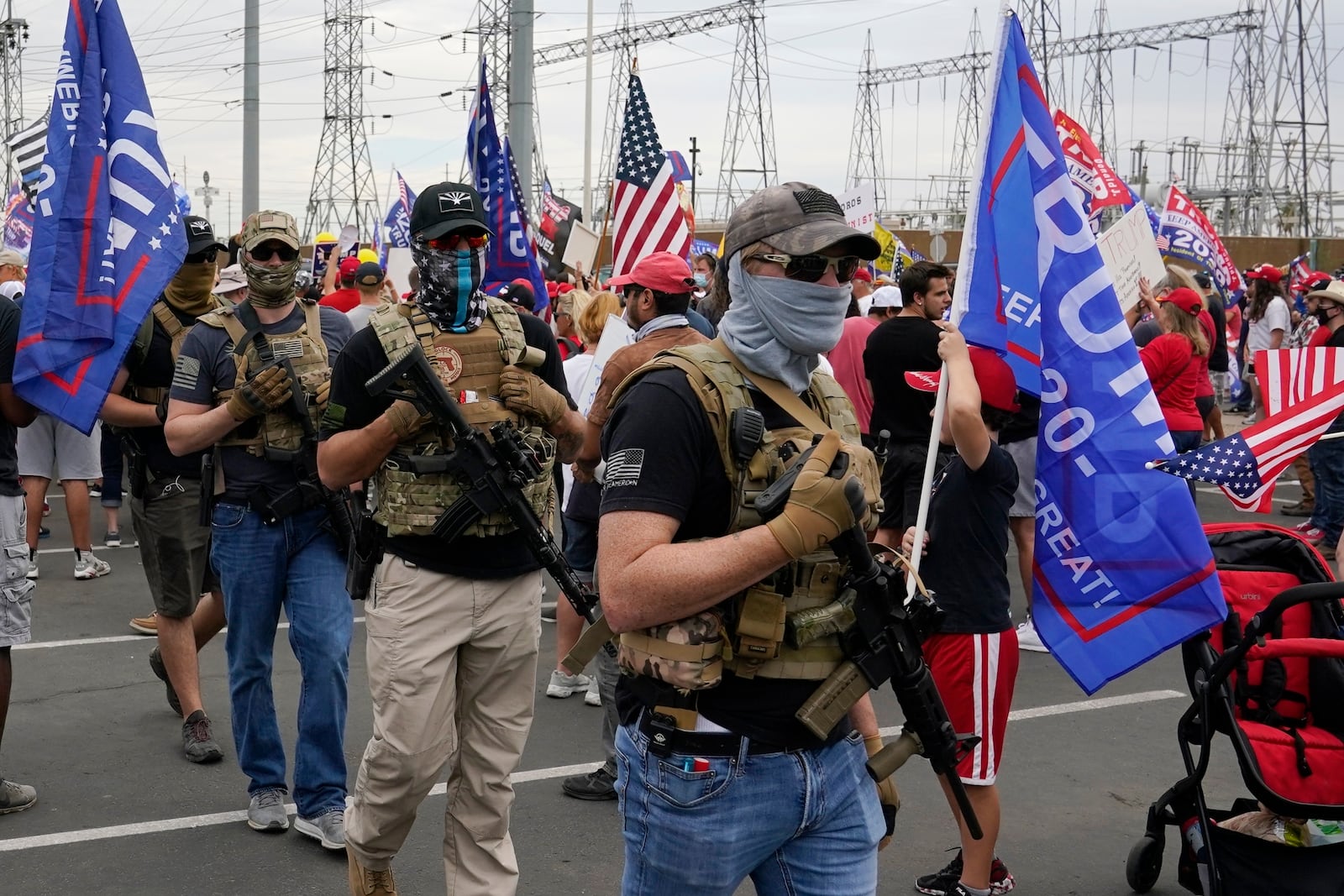 FILE - Supporters of President Donald Trump rally outside the Maricopa County Recorder's Office, Nov. 6, 2020, in Phoenix. (AP Photo/Ross D. Franklin, File)