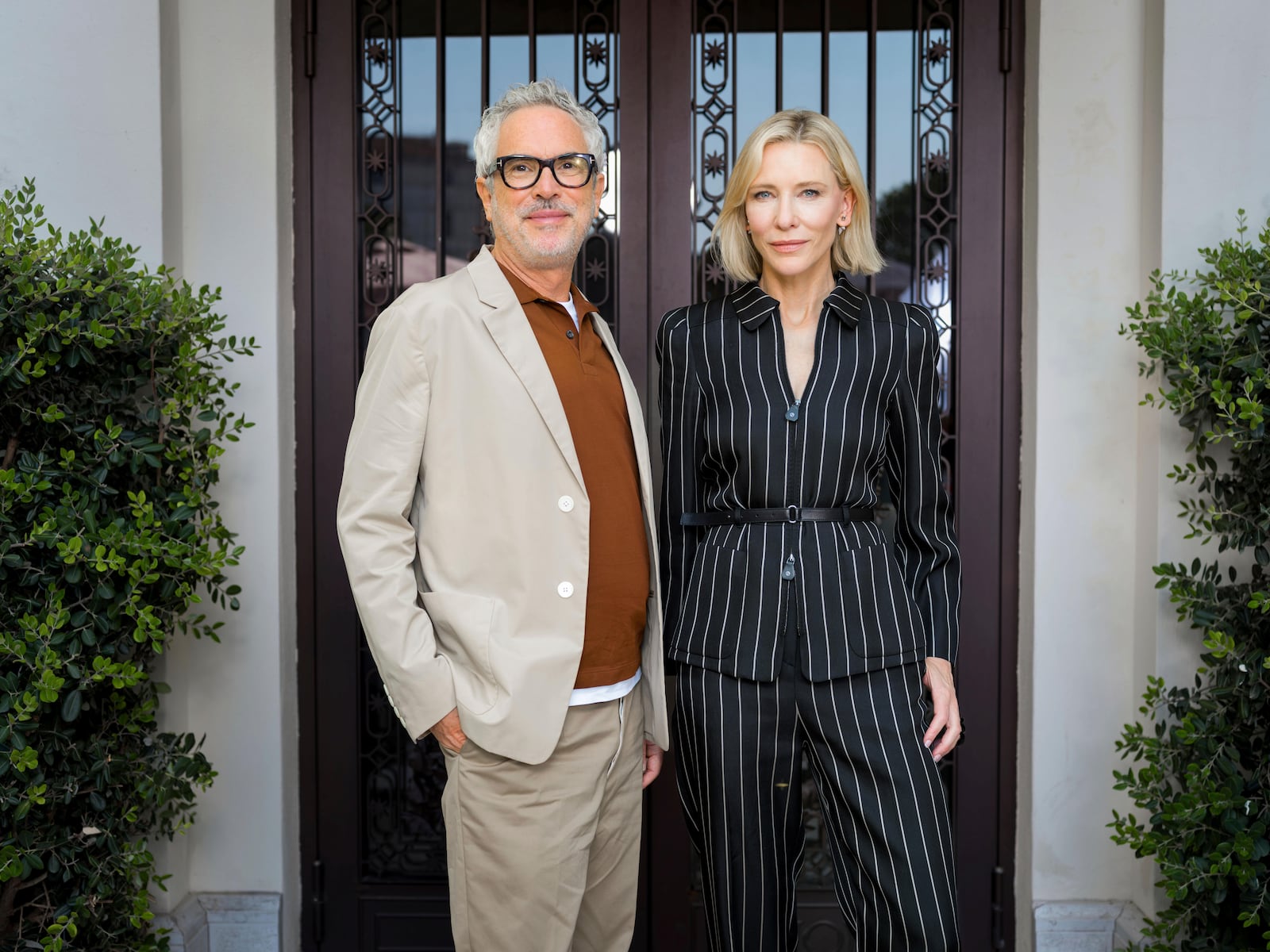 Director Alfonso Cuaron, left, and Cate Blanchett pose for portraits to promote the Apple TV series "Disclaimer" during the 81st edition of the Venice Film Festival in Venice, Italy, on Friday, Aug. 30, 2024. (Photo by Vianney Le Caer/Invision/AP)