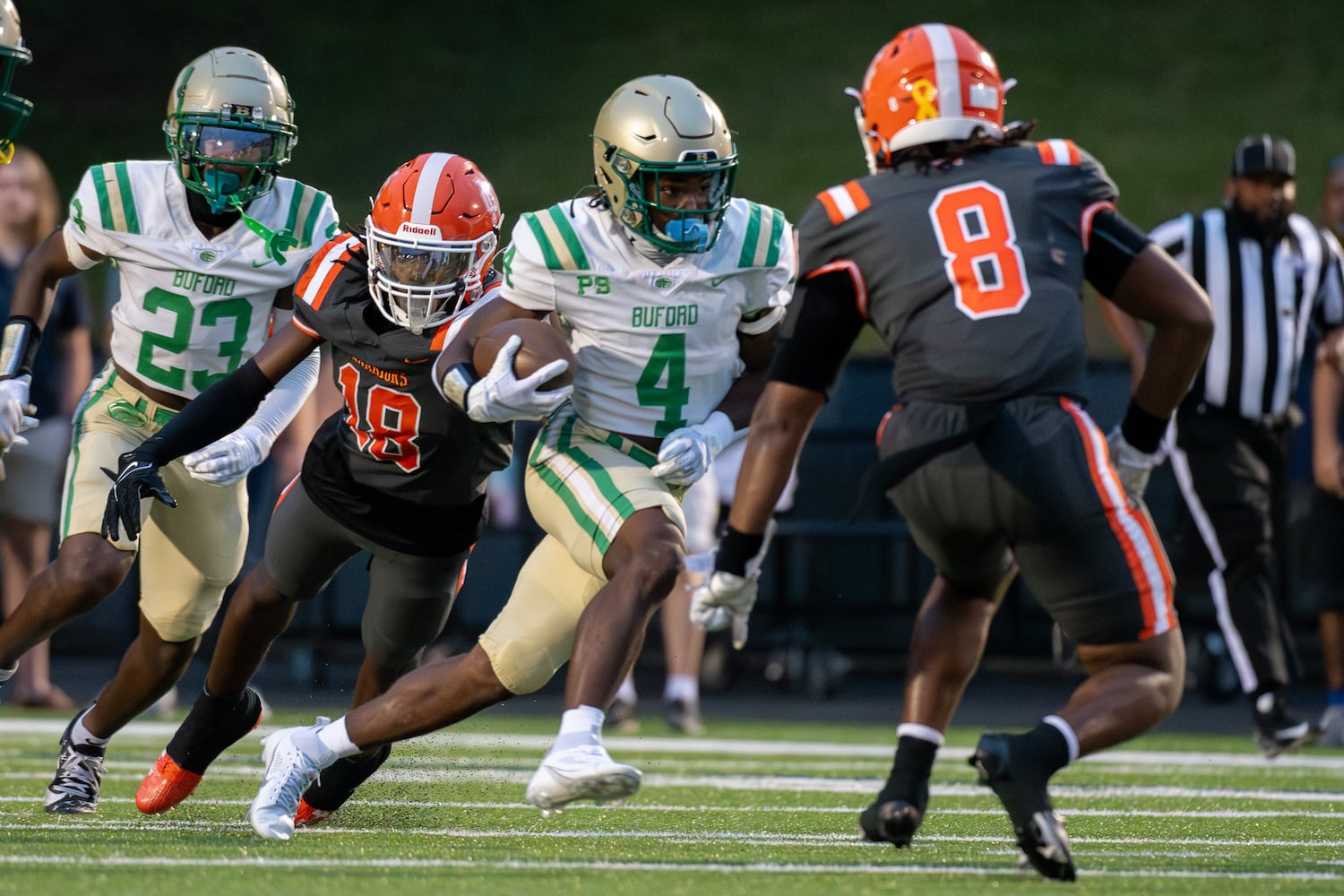 Buford's Jordan Allen attacks the North Cobb defense during Friday's game at North Cobb. (Jamie Spaar/For the AJC)