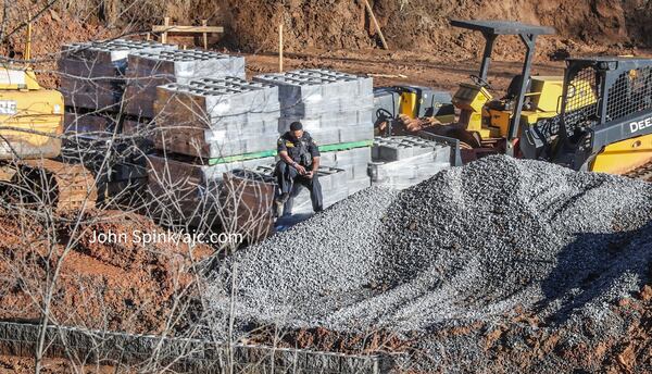 The body was discovered by construction workers who arrived at the site just before 8 a.m., police said.