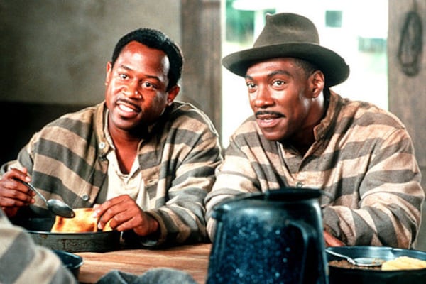 Martin Lawrence (left) as Claude Banks and Eddie Murphy (right) as Ray Gibson make plans over prison food in 'Life.'