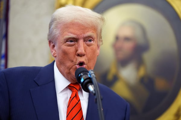 President Donald Trump speaks before Pam Bondi is sworn in as Attorney General by Supreme Court Associate Justice Clarence Thomas, in the Oval Office of the White House, Wednesday, Feb. 5, 2025, in Washington. (AP Photo/Evan Vucci)