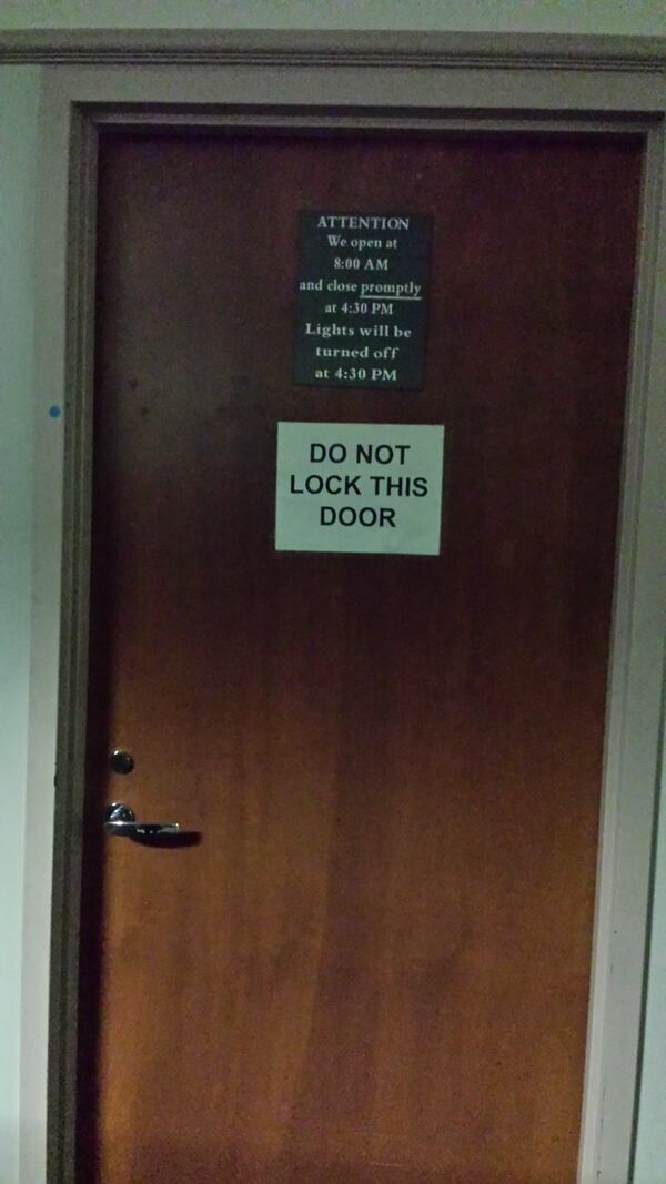 This nondescript wooden door leads to the Fulton County Tax Commissioner's Office's digest room, where the AJC and Channel 2 found public computer terminals commandeered by private businesses. JOSH WADE / CHANNEL 2 ACTION NEWS