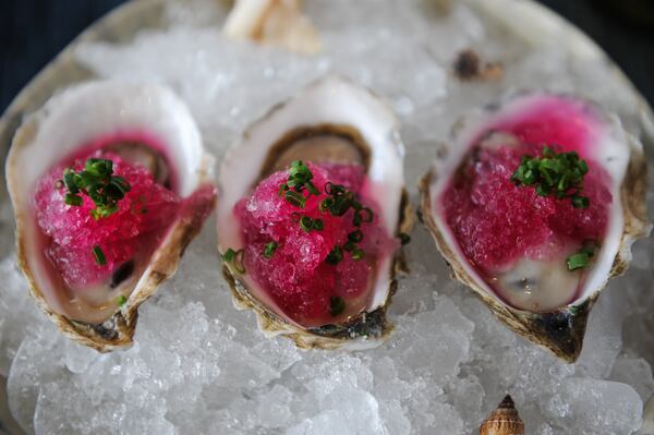 Kumamoto Oysters, served on the half shell with pickled red onion shaved ice. (BECKYSTEIN.COM)