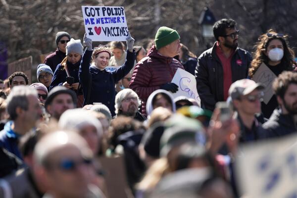 People participate in a "Stand Up for Science" rally in New York, Friday, March 7, 2025. (AP Photo/Seth Wenig)