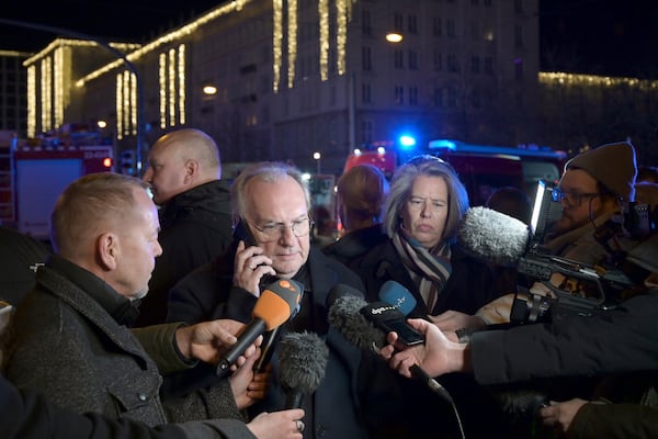 Reiner Haseloff (M, CDU), Minister President of Saxony-Anhalt, makes a statement after an incident at the Christmas market in Magdeburg, Germany, Friday Dec. 20, 2024. (Heiko Rebsch/dpa via AP)