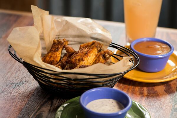  Big Tex House-Smoked Wings with Georgia peach and Alabama white sauces. Photo credit- Mia Yakel.