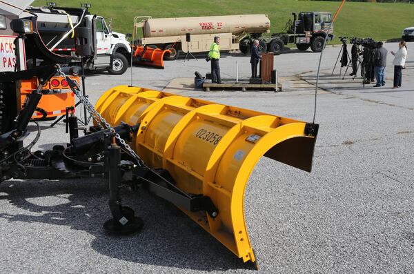 November 16, 2015 Forest Park: GDOT Commissioner Russell McMurry and State Maintenance Engineer Dale Brantley show off some of the state's new winter equipment during a press conference on Monday afternoon November 16, 2015 to discuss winter weather preparedness. Ben Gray / bgray@ajc.com