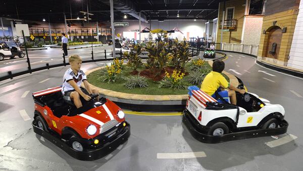 Young "drivers" learn to respect road signs and other drivers at Tiny Towne in Norcross. Tiny Towne is an entertaining, stimulating and educational experience that  introduces children ages 3 and up to real-life driving experiences and helps them steer away from dangerous, reckless driving.