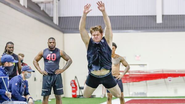 Oklahoma offensive lineman Creed Humphrey's broad jump totaled 112 inches in the school's pro day workout for NFL scouts, Friday, March 12, 2021, in Norman, Okla. (Alonzo Adams/AP)