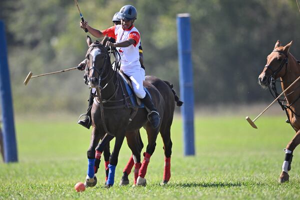 Members of the B.E.S.T. Academy polo team and the Congressional Polo Club compete in the 7th Annual Atlanta Fashion and Polo Classic on Sunday, Oct. 13, 2024, in Fairburn, GA. (Jim Blackburn for the AJC)