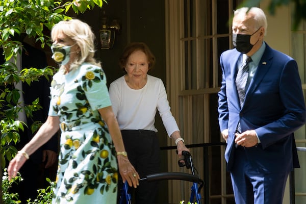 Former first lady Rosalynn Carter, center, walks U.S. President Joe Biden and first lady Jill Biden out after their visit Thursday with former President Jimmy Carter in Plains. (Brendan Smialowski/AFP/Getty Images/TNS)