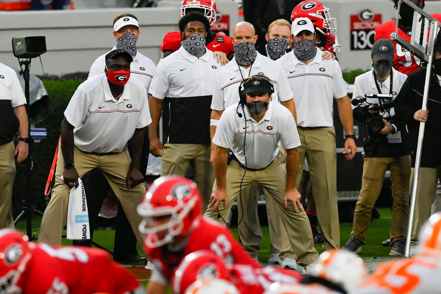 Georgia head coach Kirby Smart bends and watches the offense in red zone during the second half of a football game against Tennessee on Saturday, Oct. 10, 2020, at Sanford Stadium in Athens. Georgia won 44-21. JOHN AMIS FOR THE ATLANTA JOURNAL- CONSTITUTION