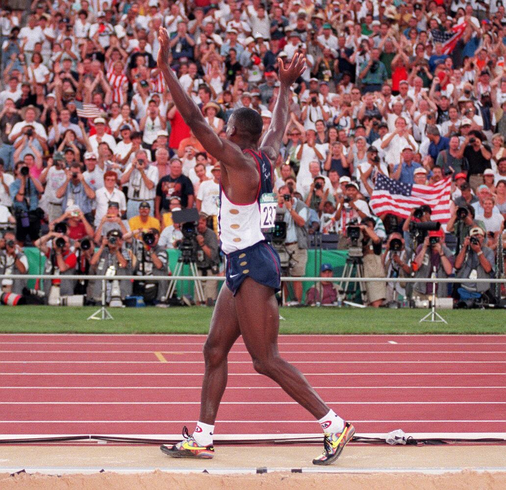 Carl Lewis wins the long jump