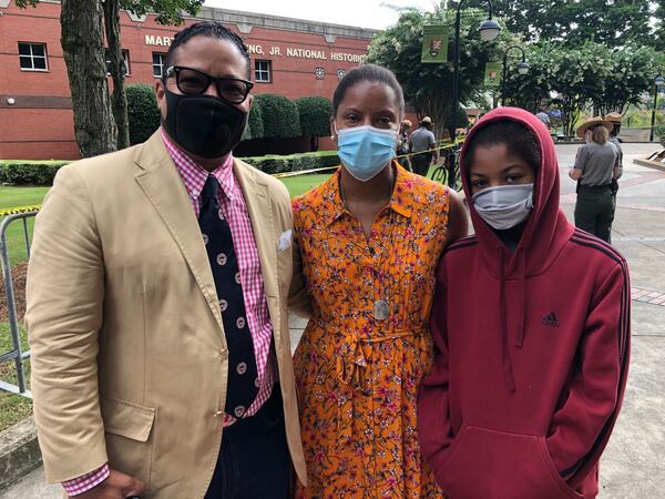 He was so special to so many of us,” Chip Joyner said Thursday as he stood outside Ebenezer Baptist Church. “The movement for equality that we celebrate today, he started. I could not let the day go by without paying my last respects.” Joyner was joined by his wife Carol and daughter Hudson as they waited in the Georgia heat for services to begin. “We realize that the opportunities that we have today are because of his sacrifice,” Carol Joyner said. “We wanted to say thank you.” (Leon Stafford / AJC)