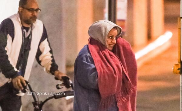 Vince Wilson and Anna Pena were bundled up Wednesday morning as they emerged from the North Avenue MARTA station.