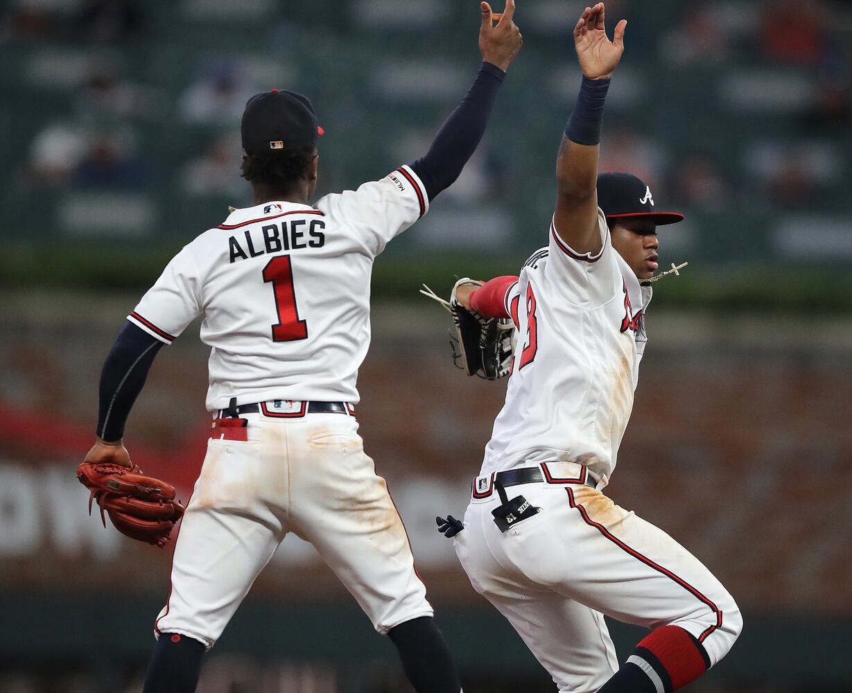 Photos: Braves win opener of key home series with Mets