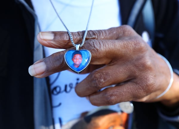 David Mack's grandmother Glenda Mack holds a heart-shaped locket of the child she raised.