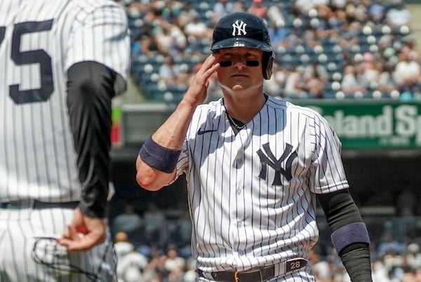 New York Yankees' Josh Donaldson (28) steps back to first base during the third inning of a baseball game against Chicago White Sox, Saturday May 21, 2022, in New York. (AP Photo/Bebeto Matthews)