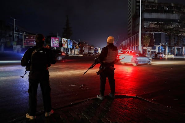 Members of the Syrian government security forces deploy at a street in Damascus, Syria, Thursday, March 6, 2025. (AP Photo/Omar Sanadiki)