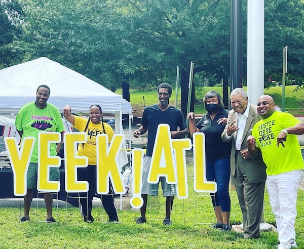 Yeek! Fest cofounders Anthony "A Dogg" Wilkins, Melanie Patrick, Ted Rush and others pose with Fulton County Commission Chairman Robb Pitts at Yeek! Fest.