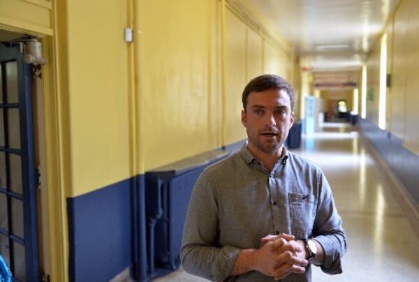 WonderRoot executive director Chris Appleton talks about upcoming renovation work to the 1922 schoolhouse on Memorial Drive that will be transformed into the headquarters of the Reynoldstown arts nonprofit. KENT D. JOHNSON/KDJOHNSON@AJC.COM