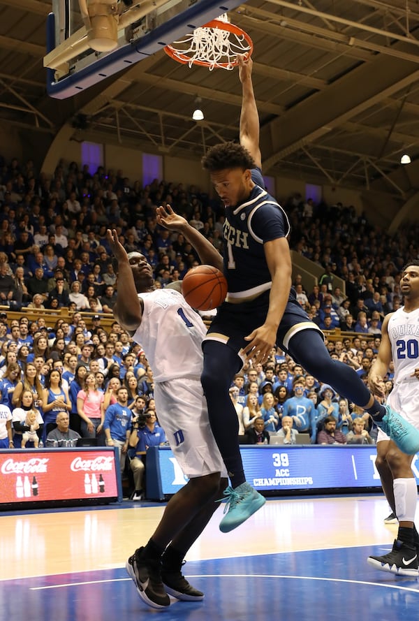 DURHAM, NORTH CAROLINA - JANUARY 26: James Banks III #1 of the Georgia Tech Yellow Jackets dunks the ball over Zion Williamson #1 of the Duke Blue Devils during their game at Cameron Indoor Stadium on January 26, 2019 in Durham, North Carolina. (Photo by Streeter Lecka/Getty Images)