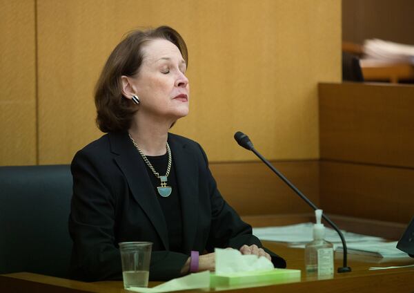 Dr. Ann Mckee Parker answers questions during Day 4 of the Waffle House chairman sex tape trial at the Fulton County Courthouse on April 6, 2018. STEVE SCHAEFER / SPECIAL TO THE AJC