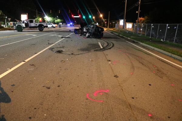 A 27-year-old man has been charged with vehicular homicide after a crash while street racing left a 50-year-old man dead, Gwinnett County police said.