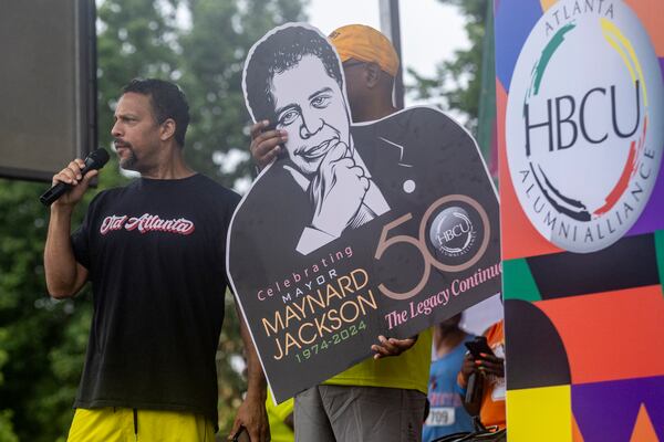 Maynard Jackson, III talks to the crowd during the opening ceremonies at the start of the 17th Annual Atlanta HBCU Alumni Alliance 5K Run/Walk at Piedmont Park on Saturday morning, June 29, 2024.   (Steve Schaefer / AJC)