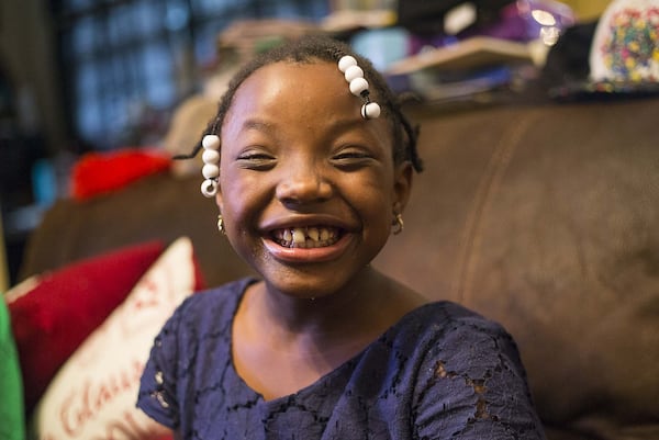 Ariah Moses, 9, is the oldest of the Moses sisters’ three adopted children. Ariah, who has cerebral palsy, had been abandoned by her birth mother, but the Moses sisters began visiting her regularly in the hospital, then fostered and later adopted her. 