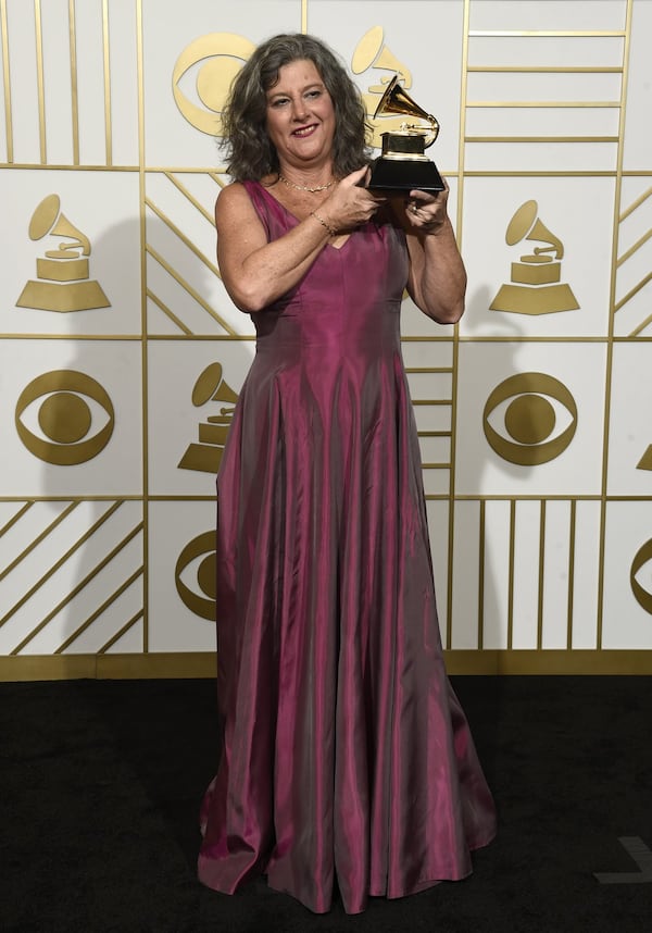 Atlanta's Susan Archie hoists her third career Grammy. Photo: AP.