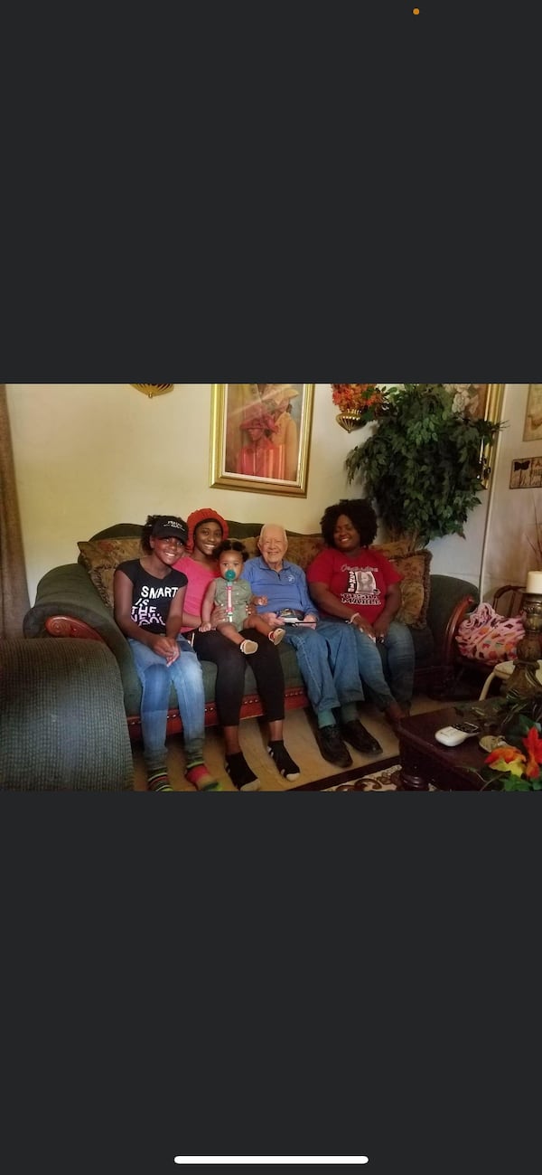 Many people who live in the small South Georgia city of Plains have met former president Jimmy Carter, who grew up there. A few years ago, Carter heard from his wife, Rosalynn Carter, about a cute baby in town. He came to visit with the family at their home and they took a photo. Pictured are Tae Bridges with her daughter, A'Moni on her lap. To her right is Tae's younger sister Sanaa Bridges. To her left are Carter and Tae's mother, Lakenya Bridges. SPECIAL