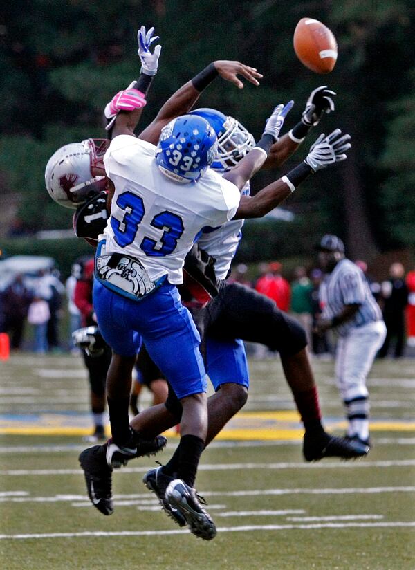 091016 Clarkston - Stephenson Jaguars defensive back #33 Jared Boyd breaks up a pass to ML King Lions wide receiver # 17 Kevin Byard during 1st half action at Dekalb-Hallford Stadium in Clarkston on Friday, Oct. 16, 2009.  Curtis Compton, ccompton@ajc.com