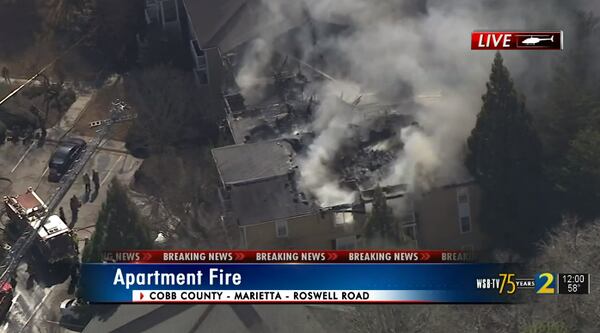 Destroyed apartments can be seen from NewsChopper 2 as crews worked to put out the blaze at an apartment complex off Roswell Road in Cobb County.