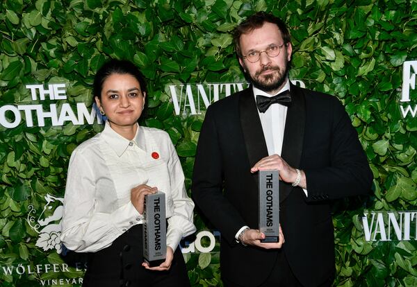 Indian filmmaker Payal Kapadia, left, and producer Thomas Hakim pose with the best international feature award for "All We Imagine as Light" during The Gothams Film Awards at Cipriani Wall Street on Monday, Dec. 2, 2024, in New York. (Photo by Evan Agostini/Invision/AP)