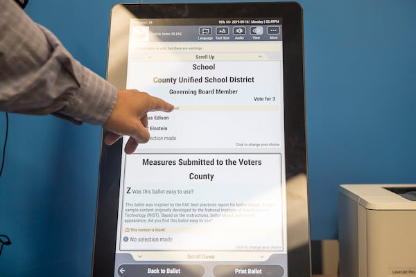 09/16/2019 -- Atlanta, Georgia -- The new Georgia voting machine at the James H. "Sloppy" Floyd building in Atlanta, Monday, September 16, 2019. A 21.5-inch touchscreen displays a ballot that voters can use to make their choices for candidates. The touchscreen, called a ballot marking device, includes accessibility options such as enlarged text and a brail touchpad. (Alyssa Pointer/alyssa.pointer@ajc.com)