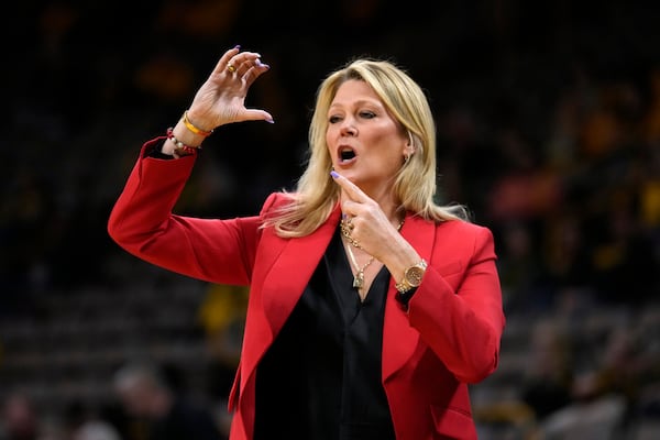 Georgia head coach Katie Abrahamson-Henderson directs her team in the first half of a first-round college basketball game against Florida State in the NCAA Tournament, Friday, March 17, 2023, in Iowa City, Iowa. (AP Photo/Charlie Neibergall)