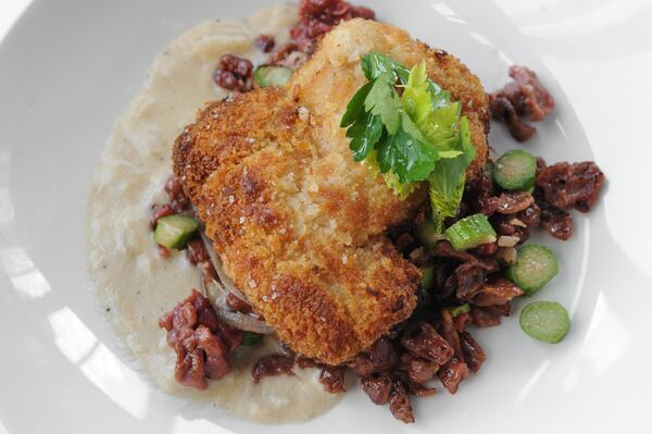 Rabbit Schnitzel with beet spatzle , asparagus, cippolini gravy. (BECKY STEIN PHOTOGRAPHY)