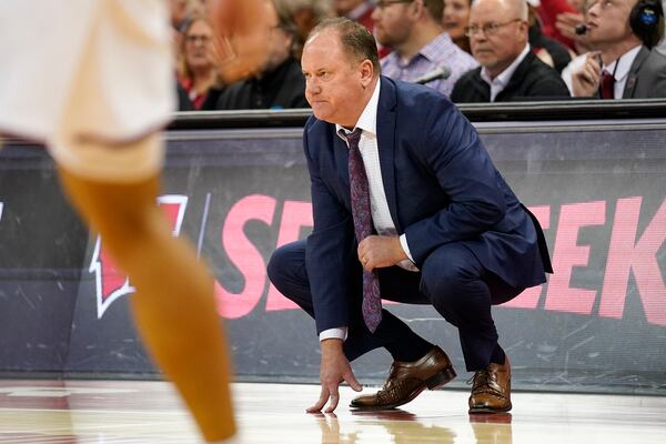 Wisconsin head coach Greg Gard watches his team play defense during the first half of an NCAA college basketball game against Michigan, Tuesday, Dec. 3, 2024, in Madison, Wis. (AP Photo/Kayla Wolf)