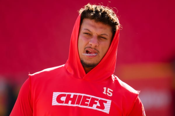 FILE - Kansas City Chiefs quarterback Patrick Mahomes chews his mouth guard during warmups before an NFL football game against the Denver Broncos, Sunday, Nov. 10, 2024 in Kansas City, Mo. (AP Photo/Reed Hoffmann, File)