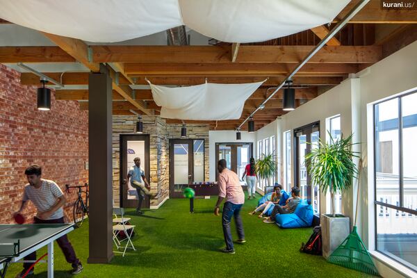 The Howard West Campus indoor quad, designed by Atlanta-based architecture firm, Kurani. at The campus is at Google headquarters in Mountain View, California.