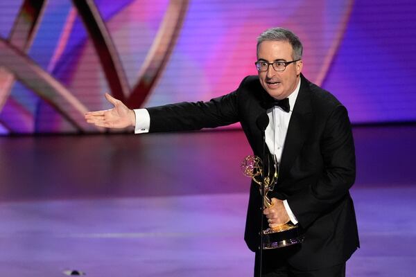 FILE - John Oliver accepts the award for outstanding scripted variety series for "Last Week Tonight With John Oliver" during the 76th Primetime Emmy Awards on Sunday, Sept. 15, 2024, at the Peacock Theater in Los Angeles. (AP Photo/Chris Pizzello, File)