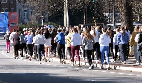 
Runners participating in the Laken Riley Walk/Run in Athens, Georgia on Saturday, Feb. 22, 2025, the one-year anniversary of the death of nursing student Laken Riley, the first homicide on University of Georgia's campus in more than two decades. (Nell Carroll for The Atlanta Journal- Constitution).
